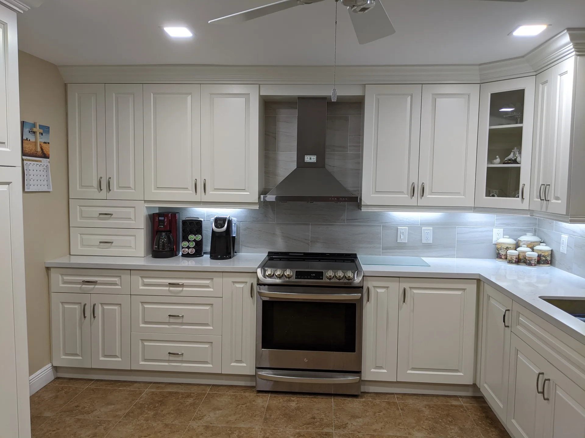 Custom white kitchen with contemporary finishes