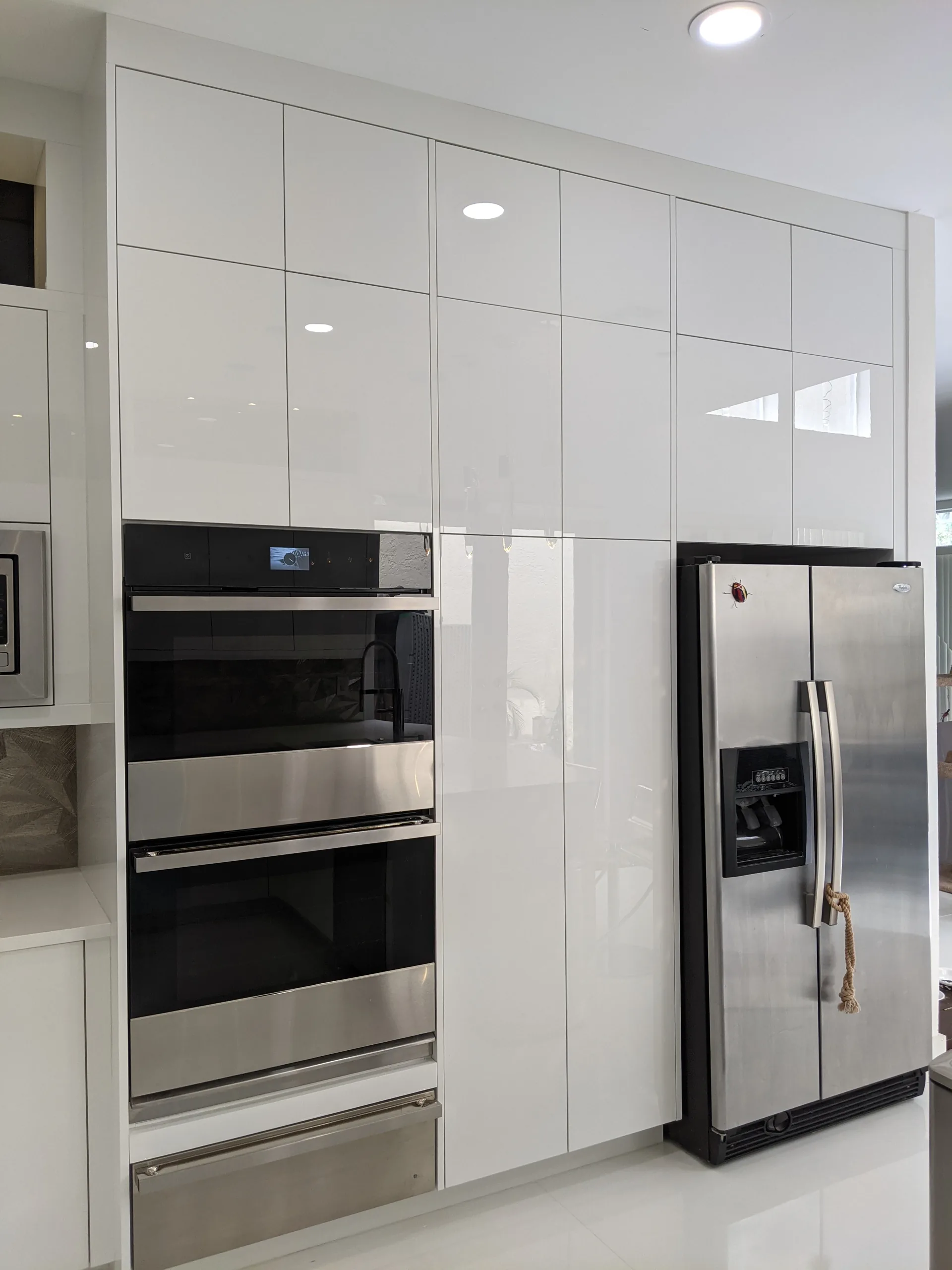 Custom white kitchen with contemporary finishes