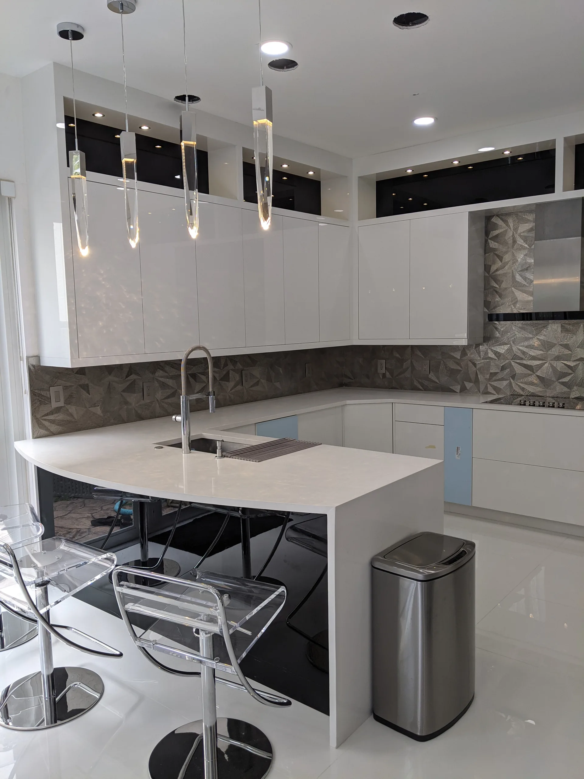 Custom white kitchen with contemporary finishes