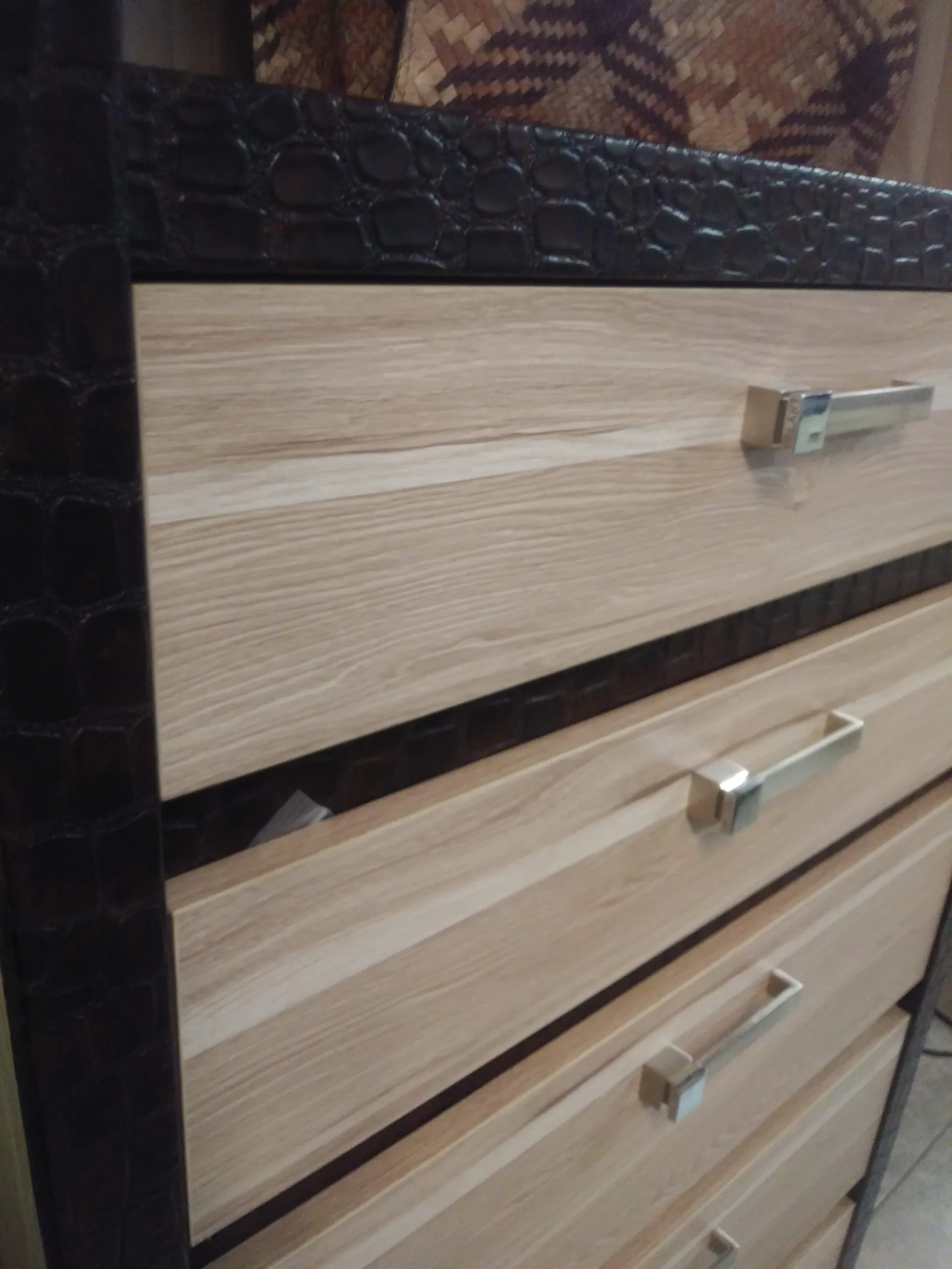 Wood closet with upholstered details