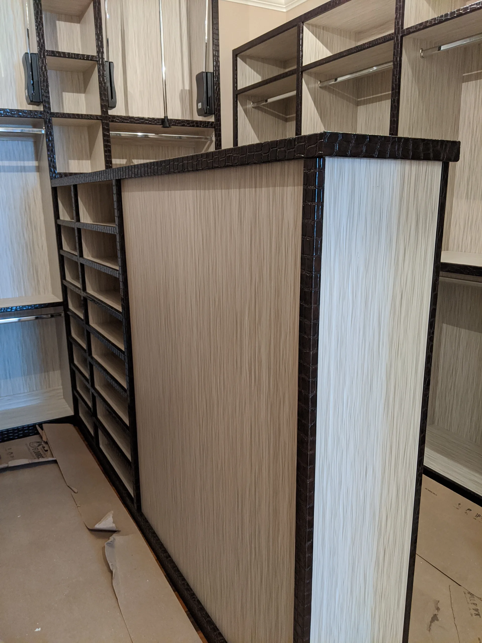 Wood closet with upholstered details
