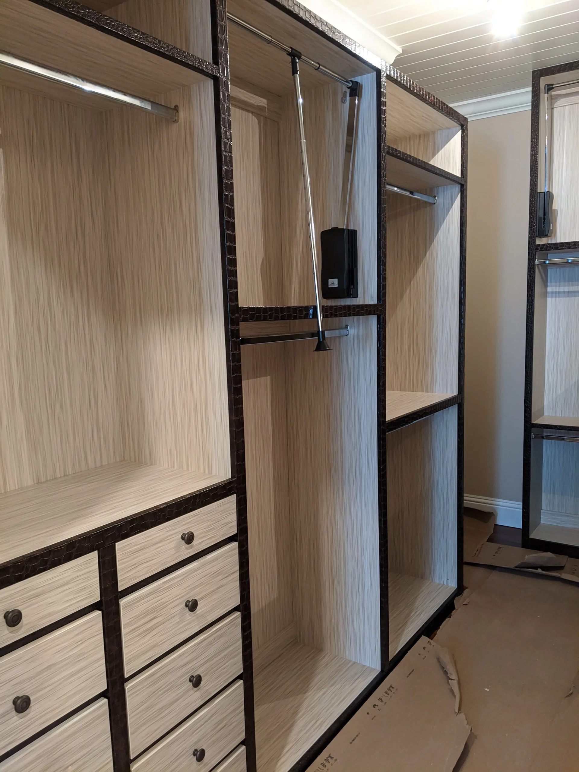 Wood closet with upholstered details